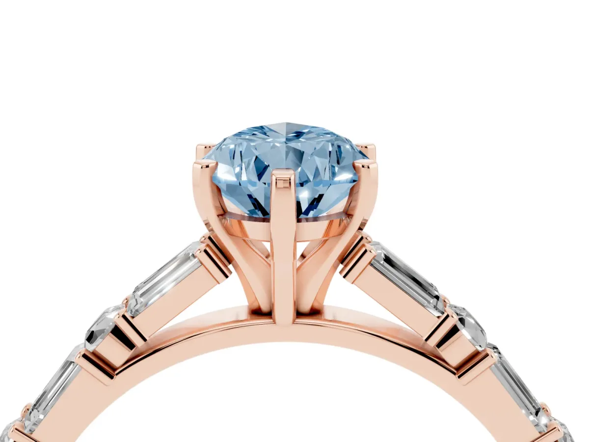 Fancy Blue Pear Cut Diamond Solitaire with Side Baguettes and Channel Set Band Rose gold