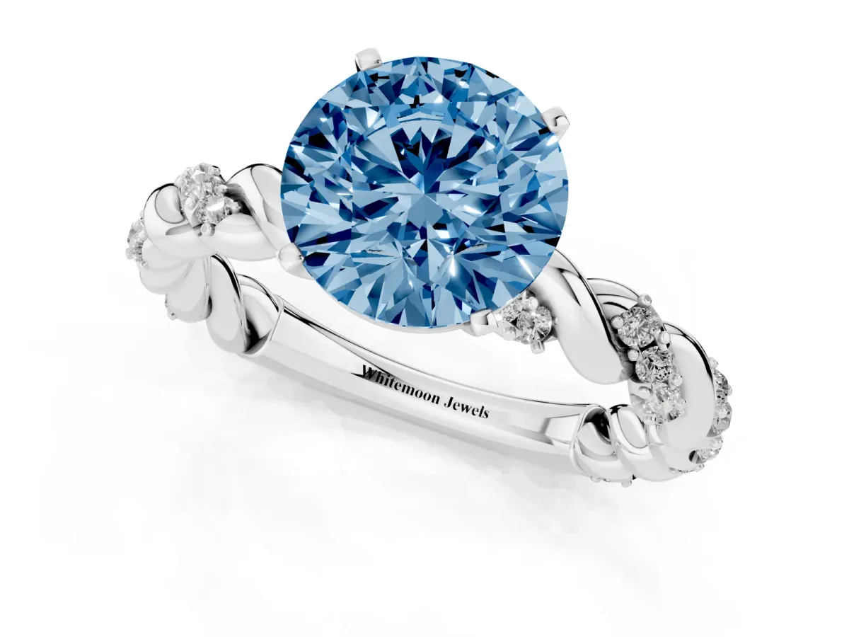 Fancy Blue Round Cut Diamond Solitaire Ring with Twisted Band and Pavé Accents Silver