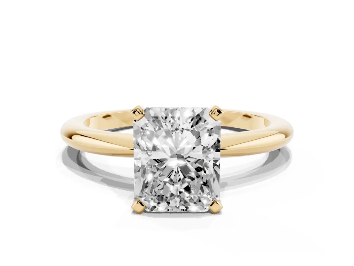 Radiant Cut Diamond Solitaire Ring with Prong Setting and Classic Band Yellow gold