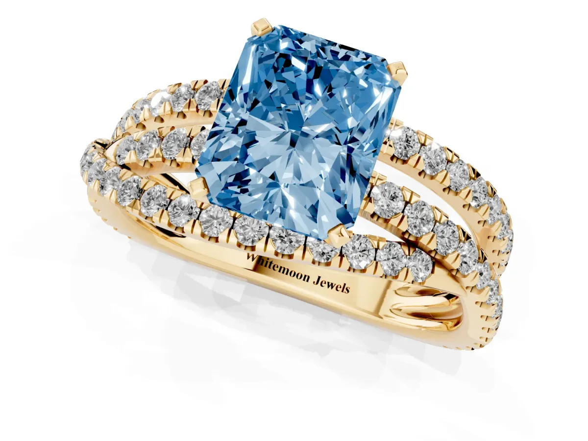 Fancy Blue Radiant Cut Solitaire Twist Band with Pavé Setting and Four-Prong Setting Yellow gold