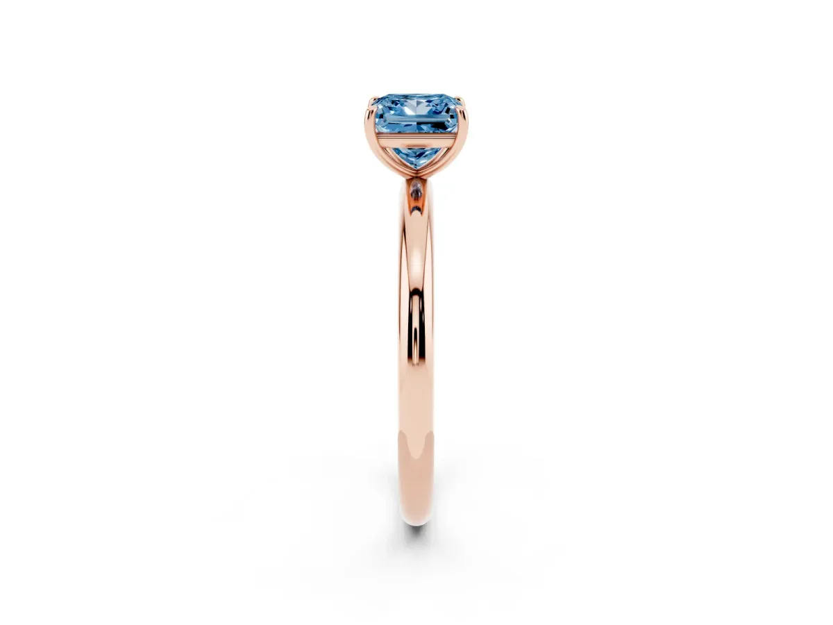 Fancy Blue Princess Cut Solitaire Diamond Ring with Four-Prong Setting on a Plain Band Rose gold