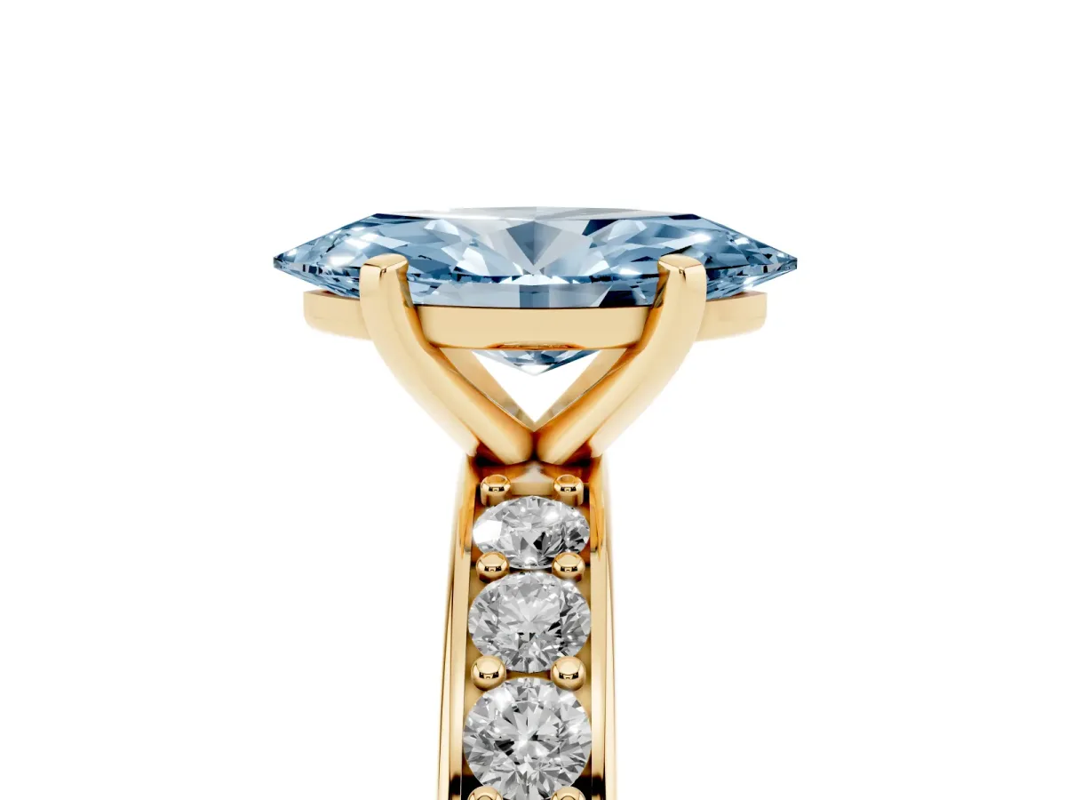 Fancy Blue Marquise Cut Diamond Engagement Ring with Channel Set Round Band and Prong Setting Yellow gold