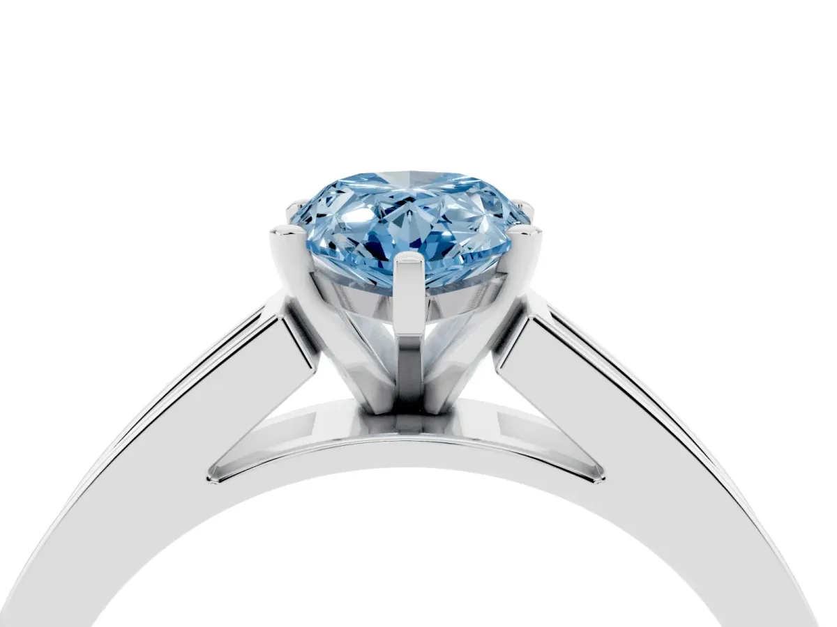 Fancy Blue Pear Cut Solitaire Diamond Ring with Channel-Set Band and Four-Prong Setting Silver