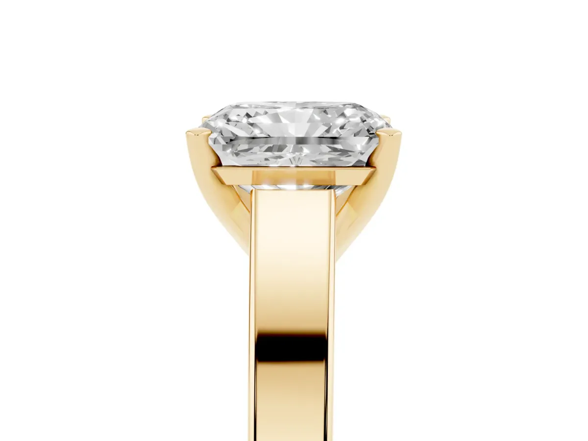 Radiant Cut Solitaire Engagement Ring with Four-Prong Setting and Tapered Band Yellow gold