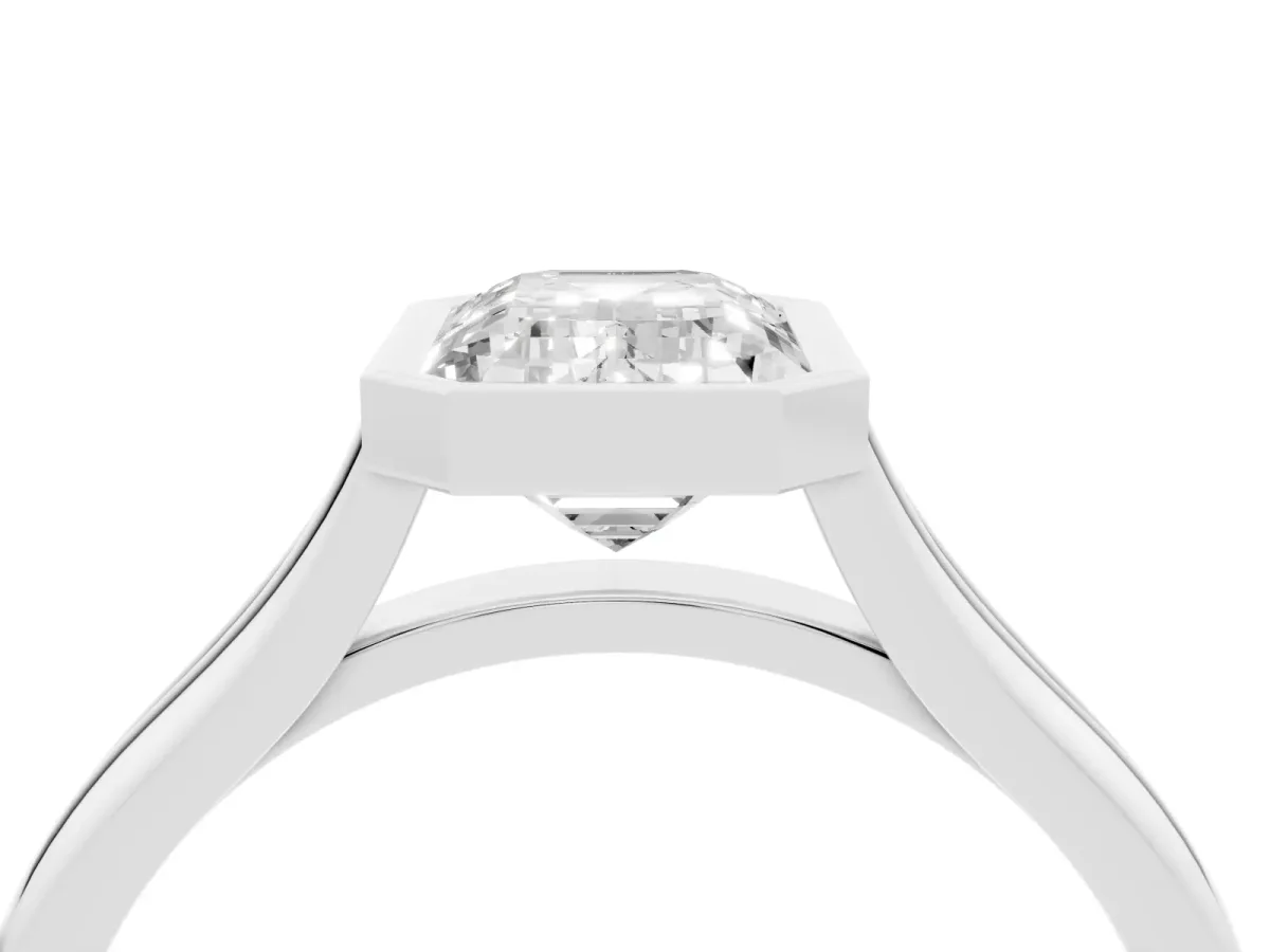 Bezel Set Emerald Cut Cut Solitaire Ring with Tapered Band Silver