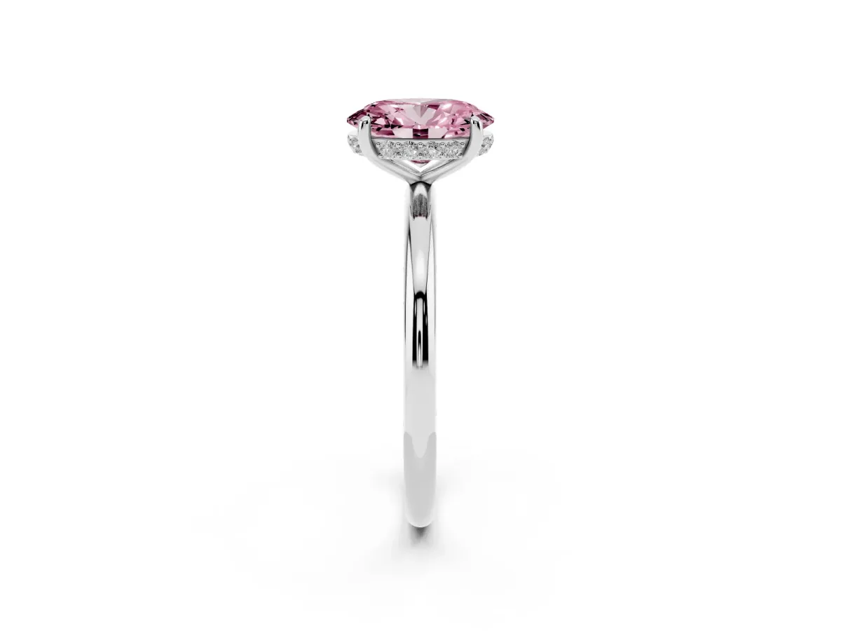 Fancy Pink Oval Cut Solitaire Diamond Ring with a Classic Band and Four-Prong Setting Silver
