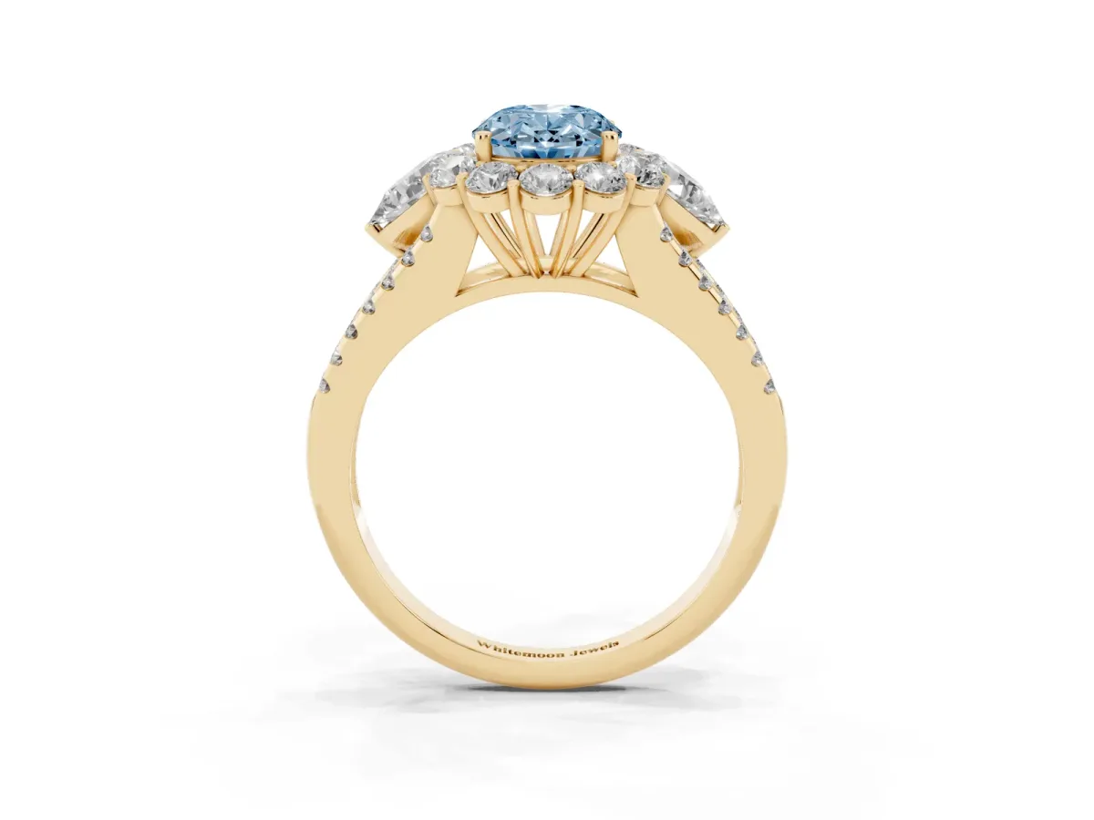 Fancy Blue Oval Cut Halo Split Shank Diamond Engagement Ring with Prong Setting Yellow gold