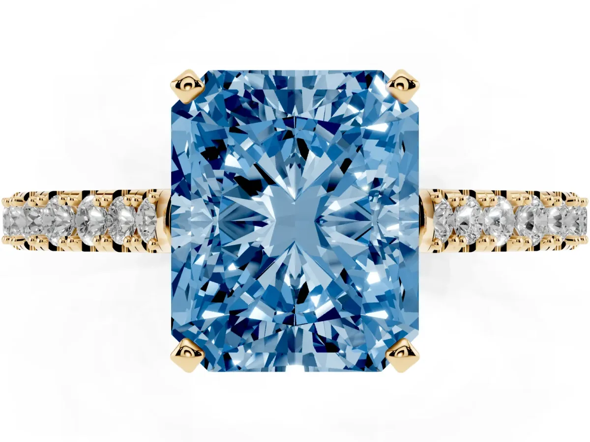 Fancy Blue Radiant Cut Cut Solitaire Diamond Engagement Ring with Pave Band and Four-Prong Setting Yellow gold