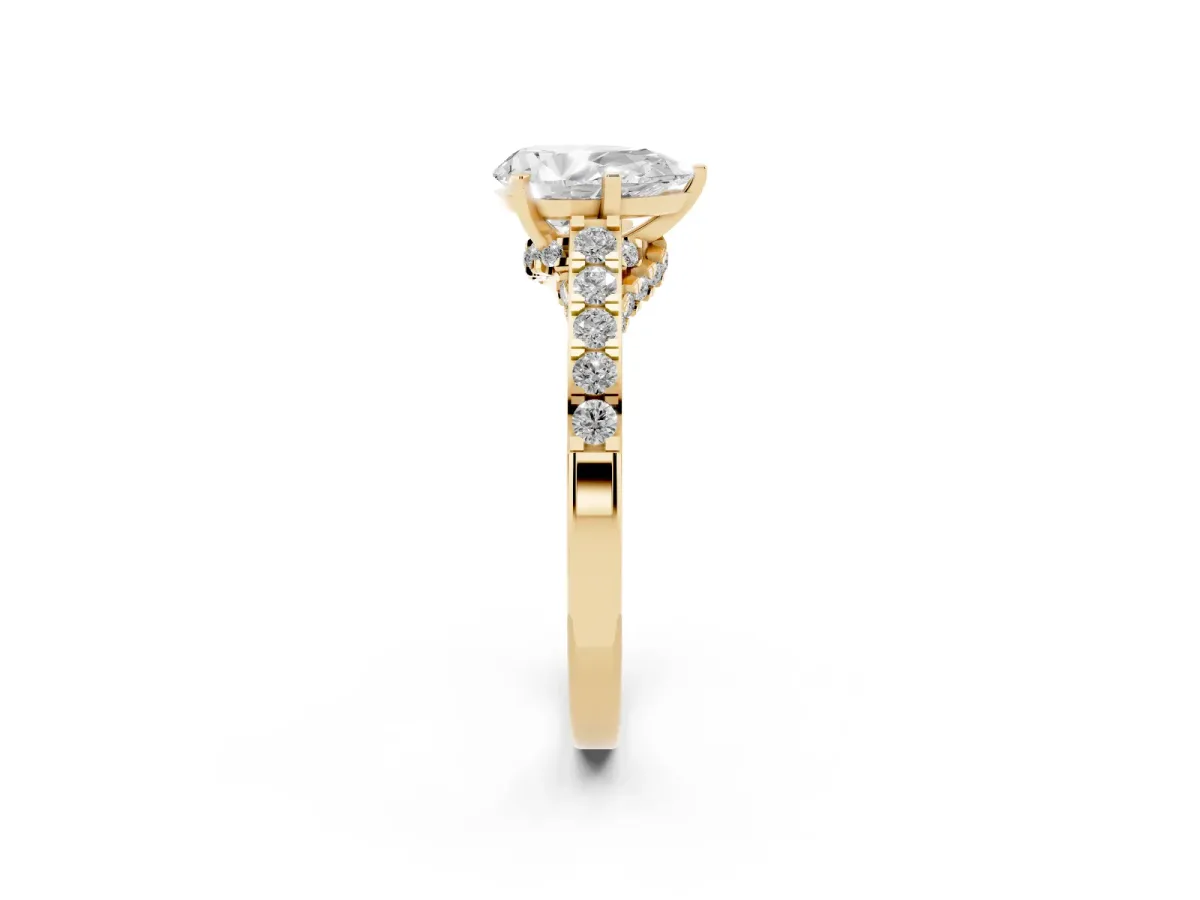 Pear Cut Diamond Solitaire Ring with Crossover Gallery and Round Pavé Band Yellow gold