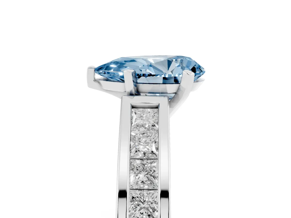 Fancy Blue Pear Cut Solitaire Diamond Ring with Channel-Set Band and Four-Prong Setting Silver