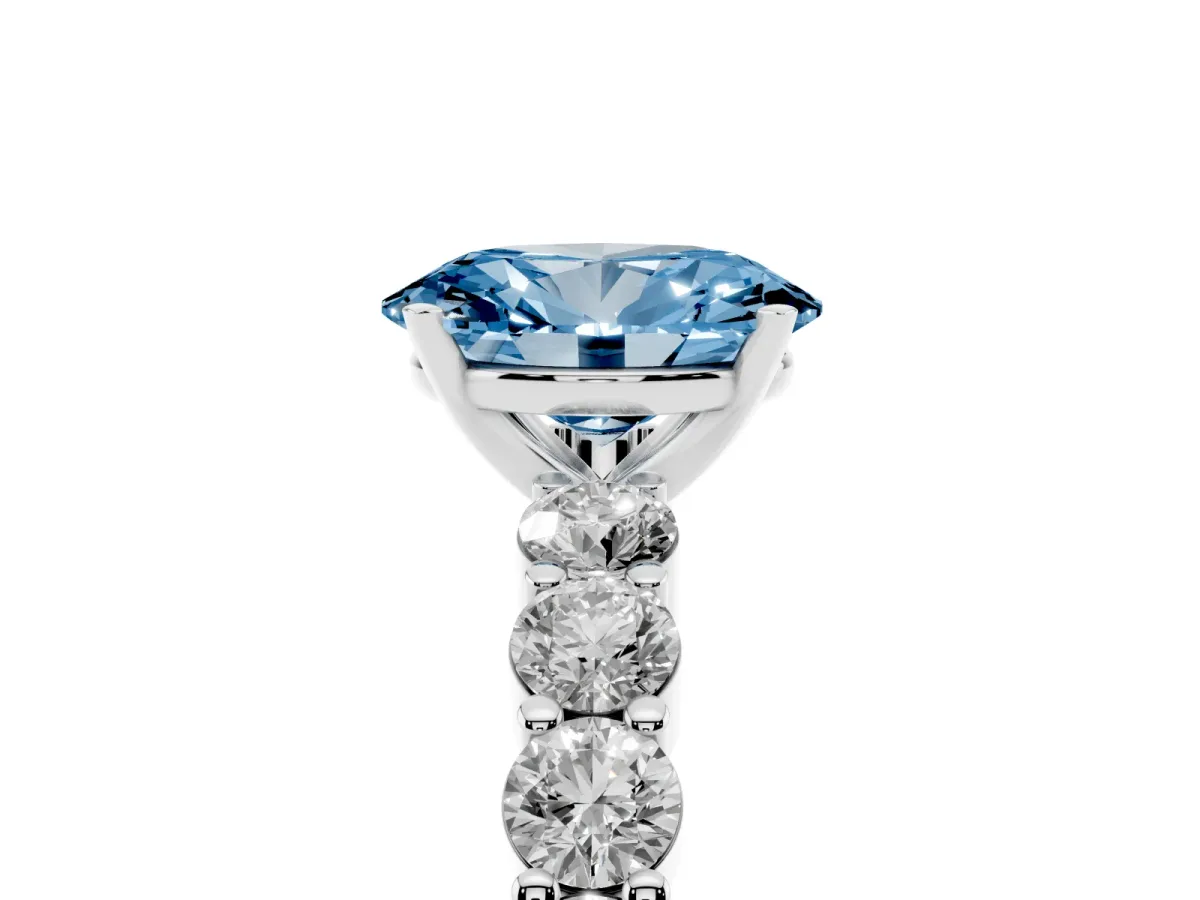 Fancy Blue Oval Cut Diamond Solitaire Ring with Shared Prong Round Side Stones Silver