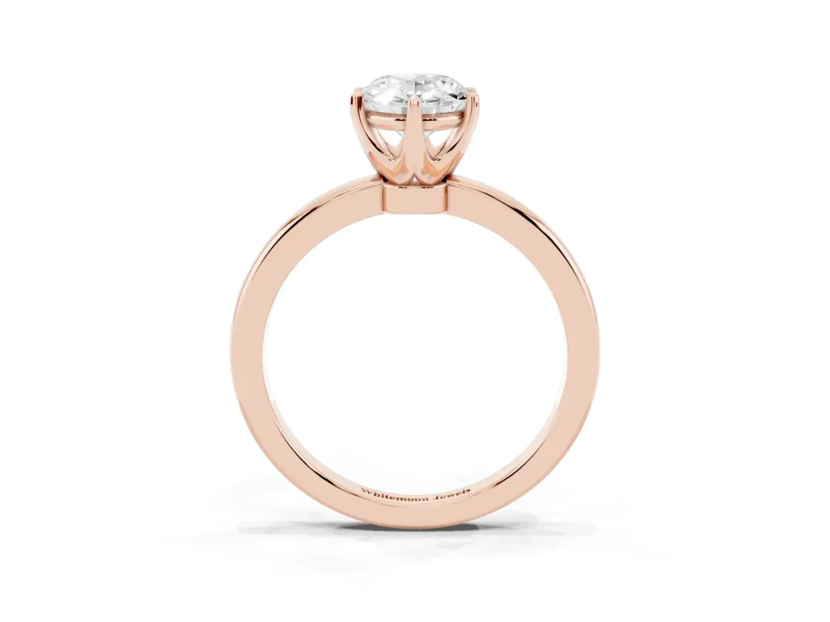 Oval Cut Solitaire Diamond Ring with Six-Prong Setting on a Classic Band Rose gold