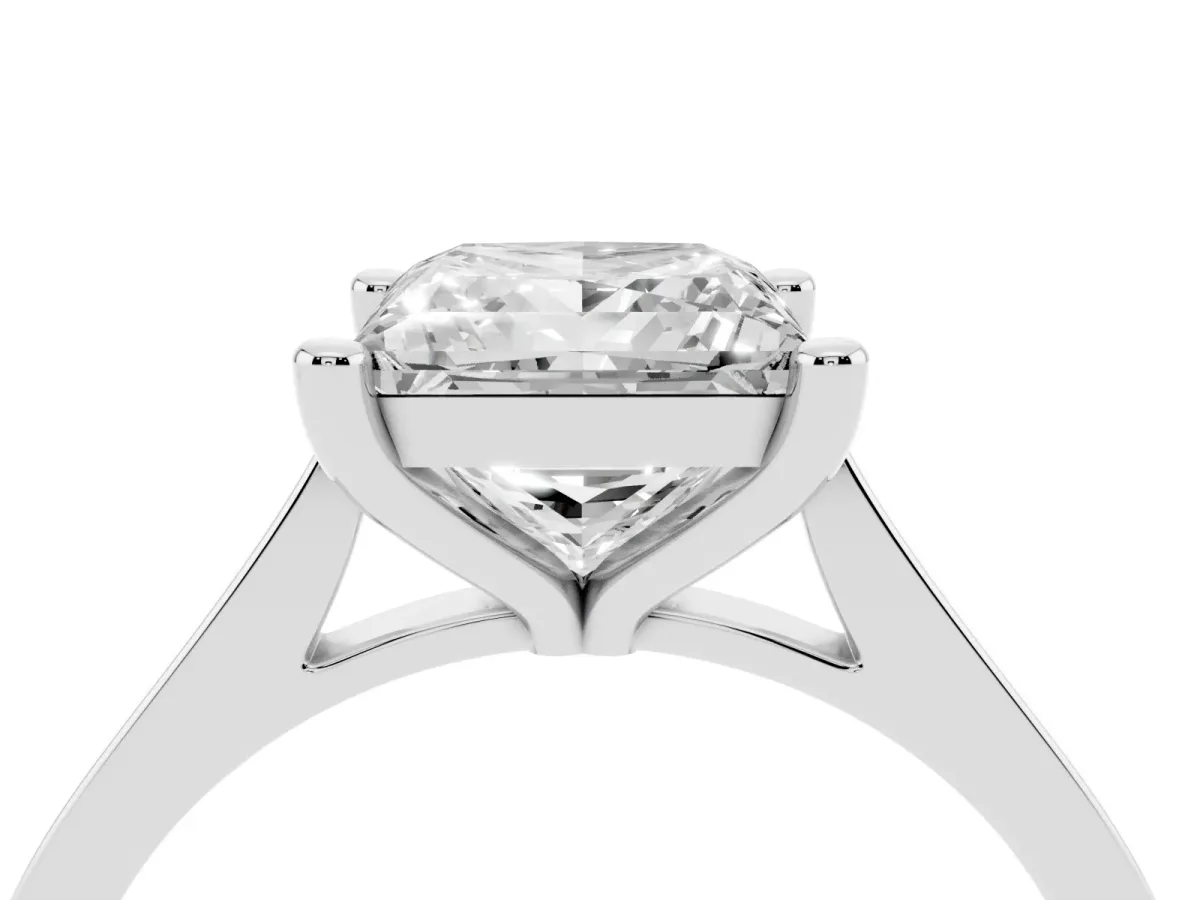 Princess Cut Solitaire Diamond Ring with Four-Prong Setting and Tapered Band Silver