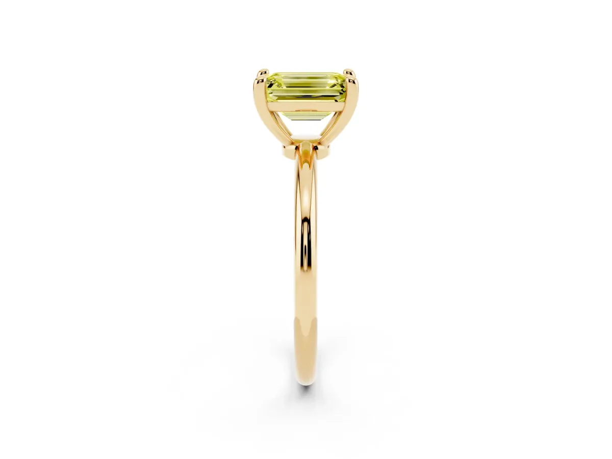 Fancy Yellow Emerald Cut Solitaire Diamond Ring with 4-Prong Setting on a Classic Band Yellow gold