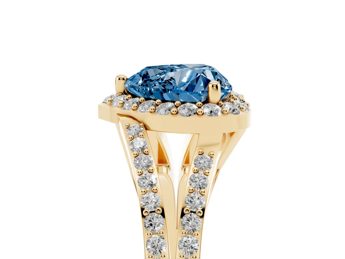 Fancy Blue Heart Cut Halo Split Shank Pave Diamond Ring with Four-Prong Setting Yellow gold