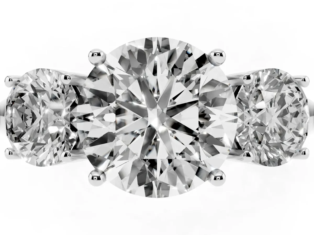 Three-Stone Round Cut Cut Diamond Engagement Ring with Prong Setting on a White Gold Band Platinum