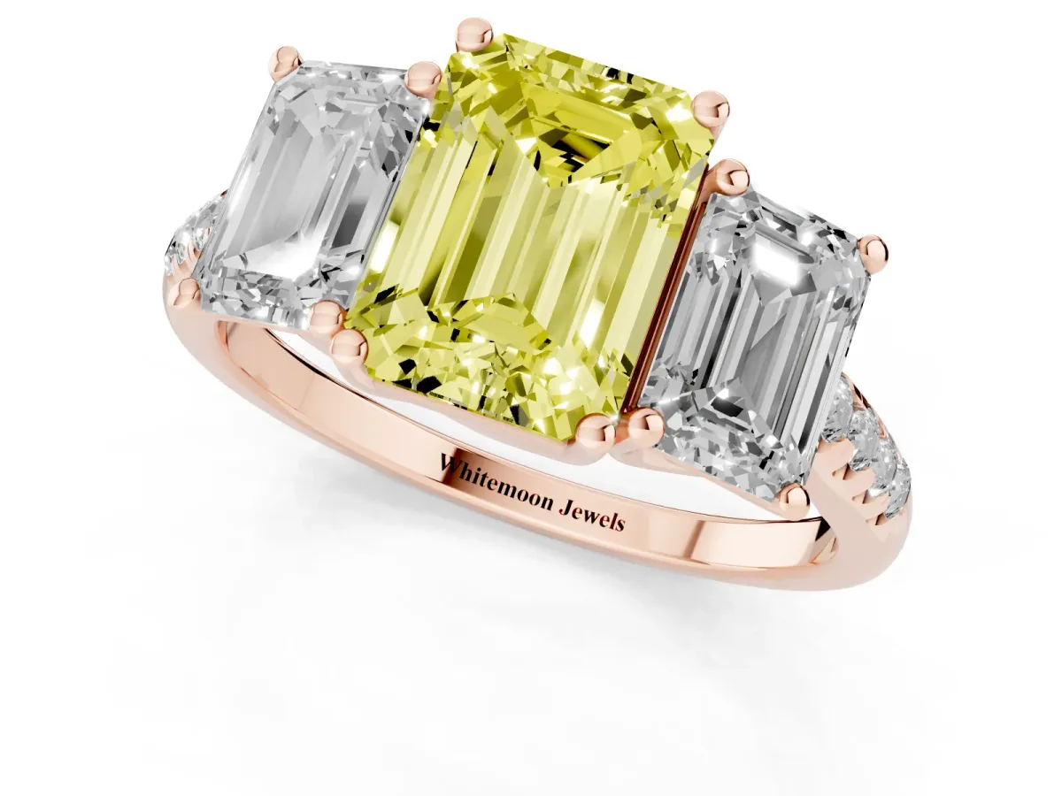 Fancy Yellow Three-Stone Emerald Cut Diamond Ring with Round Pavé Band and Prong Setting Rose gold