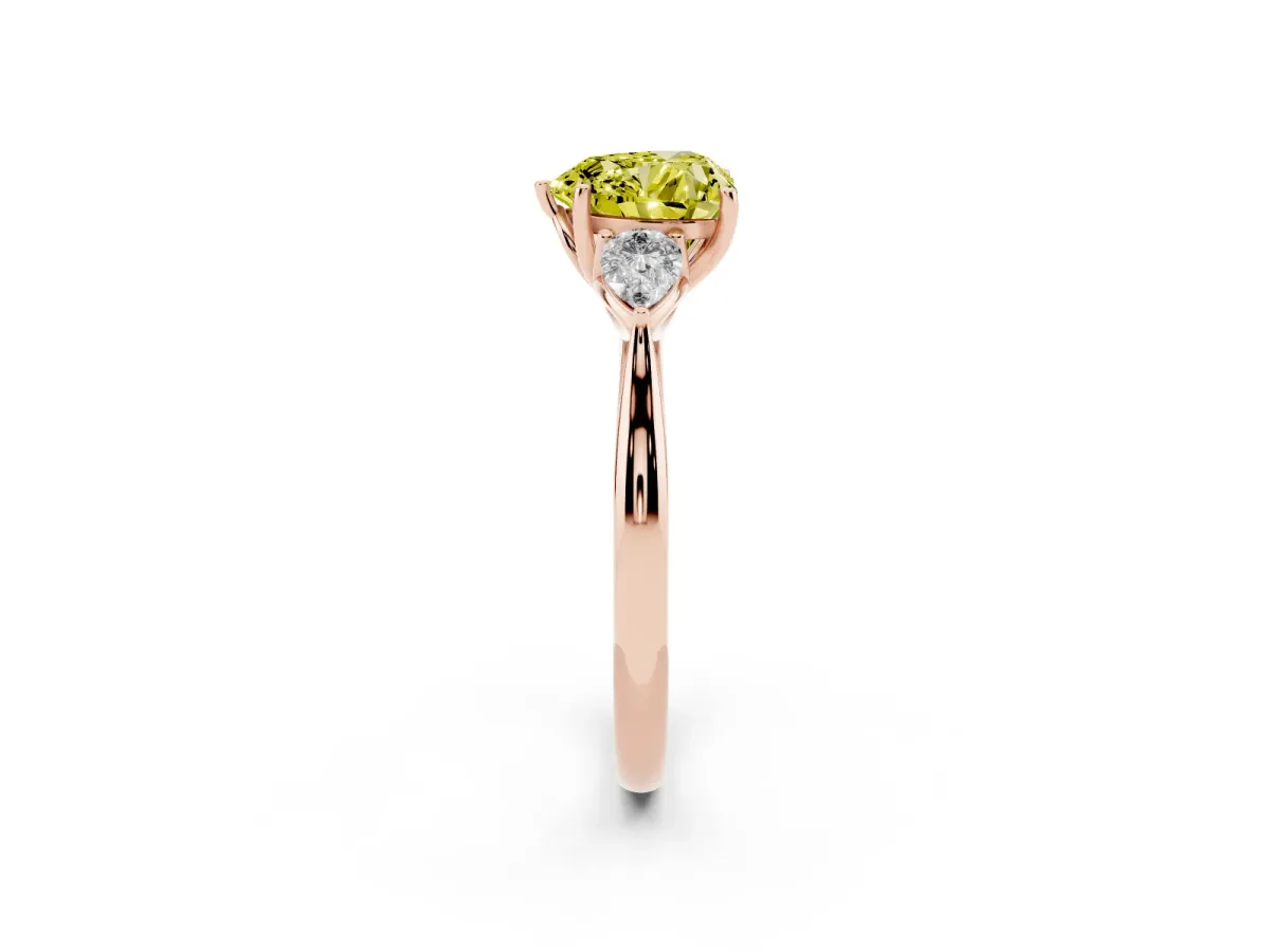 Fancy Yellow Three-Stone Heart Cut Diamond Ring with Pear Side Stones in Four-Prong Setting Rose gold