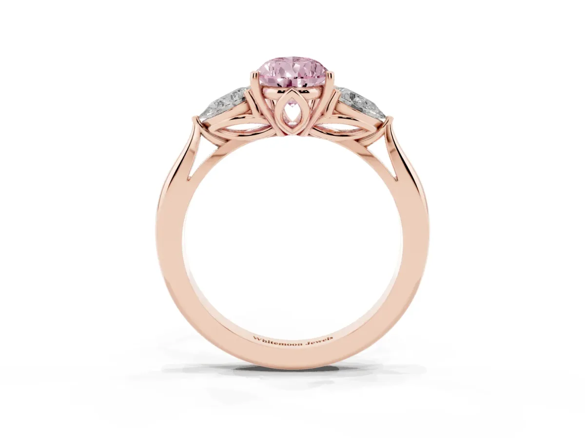 Fancy Pink Three-Stone Pear Cut Brilliant Diamond Solitaire Ring with Tapered Band and Four-Prong Setting Rose gold