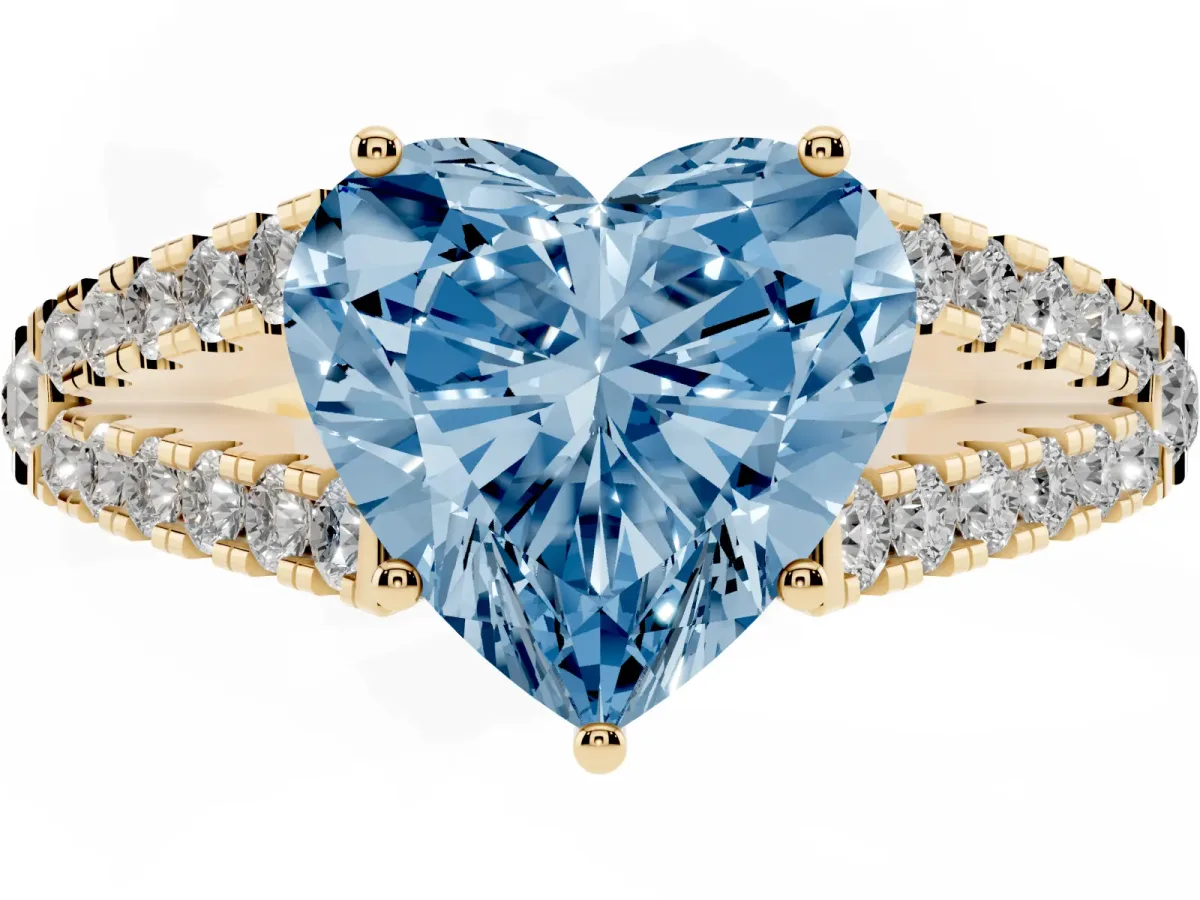 Fancy Blue Heart Cut Diamond Split Shank Pavé Engagement Ring with Four-Prong Setting Yellow gold