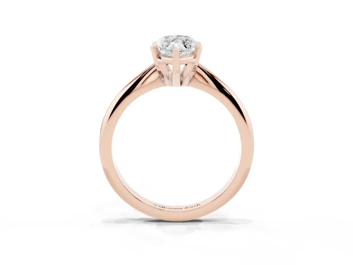 Marquise Cut Cut Solitaire Ring with Four-Prong Setting on a Classic Band Rose gold