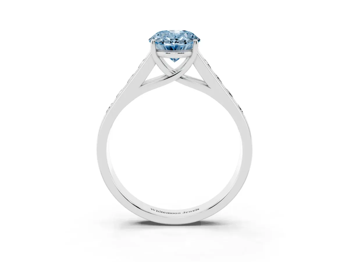 Fancy Blue Oval Cut Brilliant Channel-Set Solitaire Ring with Four-Prong Setting Silver