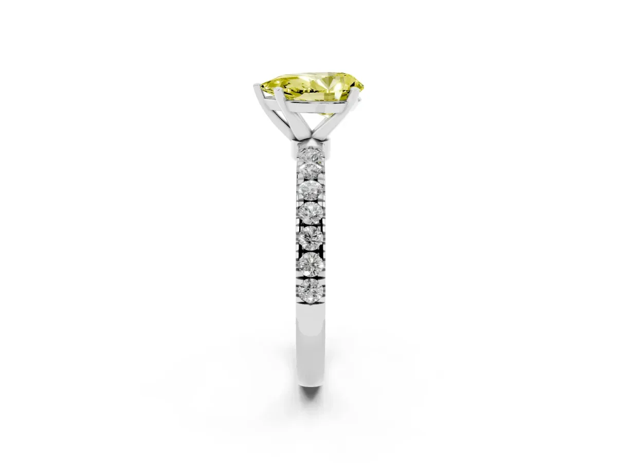 Fancy Yellow Pear Cut Diamond Solitaire Ring with Pavé Accents and Four-Prong Setting Silver