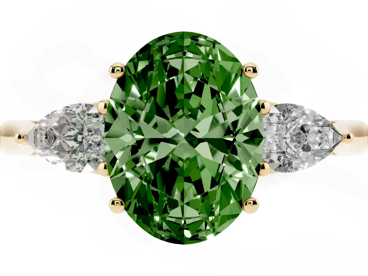 Fancy Green Three-Stone Oval Cut Brilliant Diamond Solitaire Ring with Tapered Band and Four-Prong Setting Yellow gold
