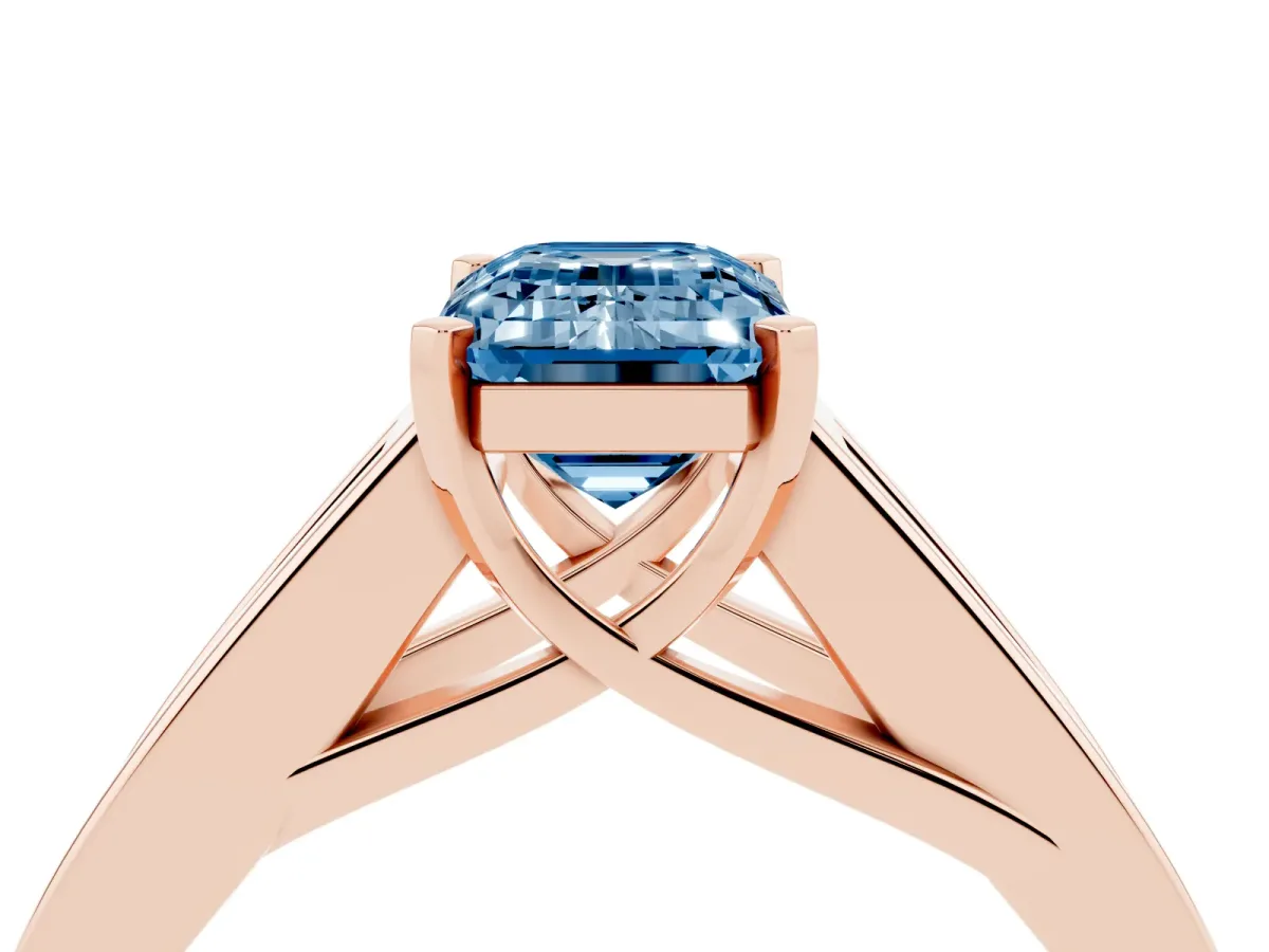Fancy Blue Emerald Cut Cut Channel Set Solitaire Ring with Four-Prong Setting Rose gold