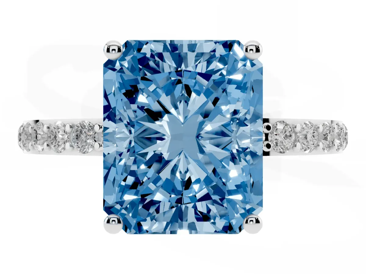 Fancy Blue Radiant Cut Diamond Solitaire Ring with Round Pavé Shoulders and Prong Setting Silver