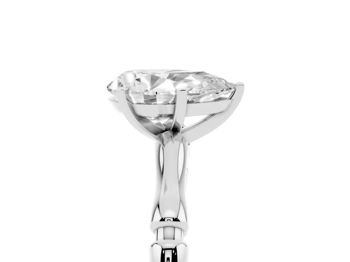 Pear Cut Solitaire Diamond Ring with Bamboo Band and Four-Prong Setting Platinum