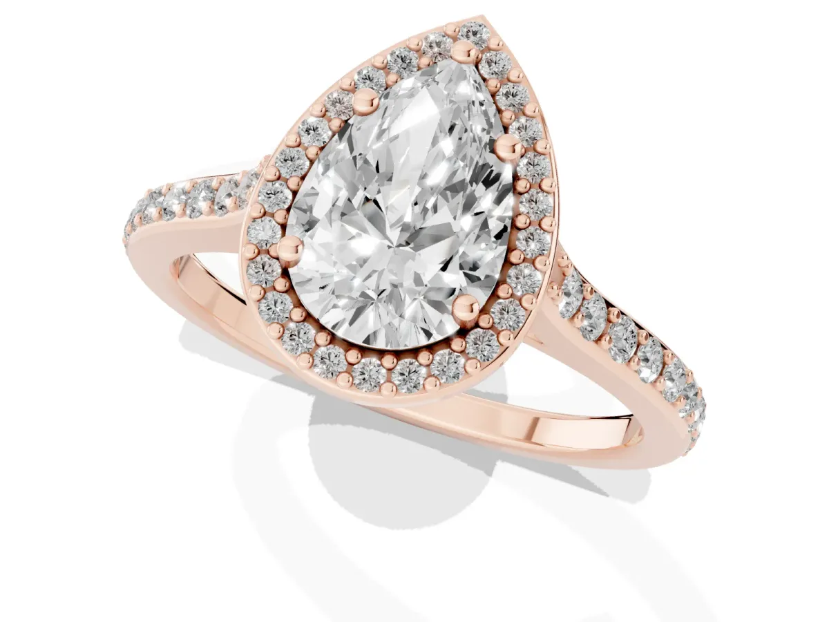 Pear Cut Diamond Halo Engagement Ring with Round Pavé Shoulders and Prong Setting Rose gold