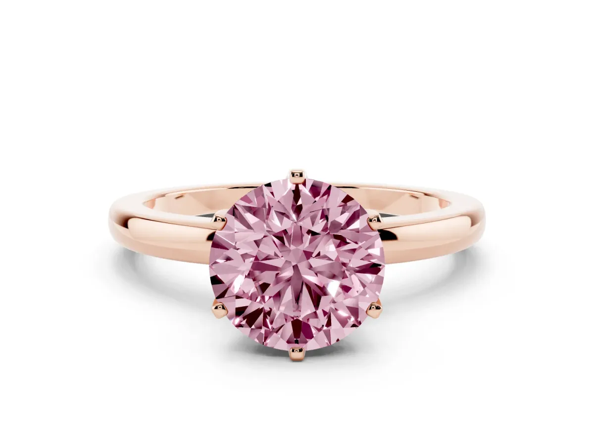 Fancy Pink Round Cut Solitaire Diamond Ring with Six-Prong Setting on a Classic Band Rose gold