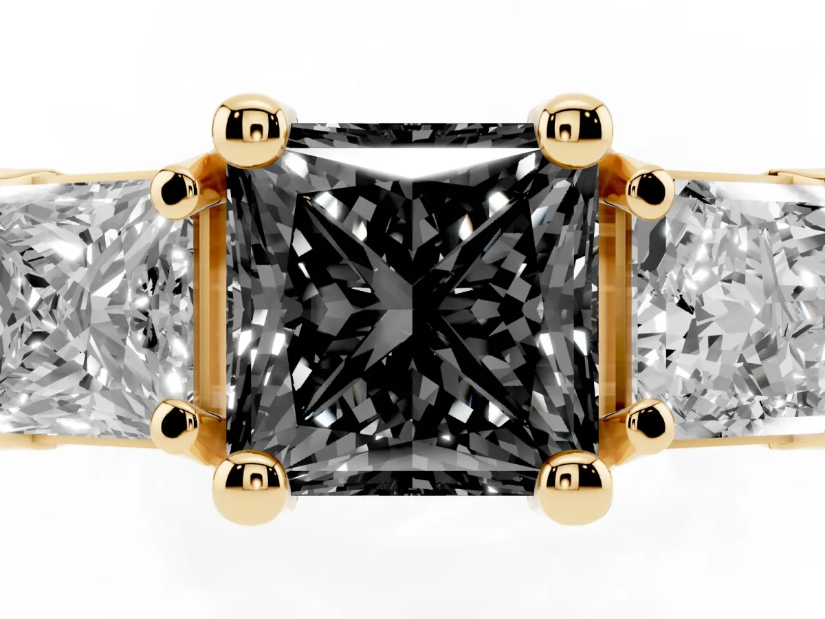 Fancy Black Princess Cut Diamond Three-Stone Ring with Channel Set Band and Four-Prong Setting Yellow gold
