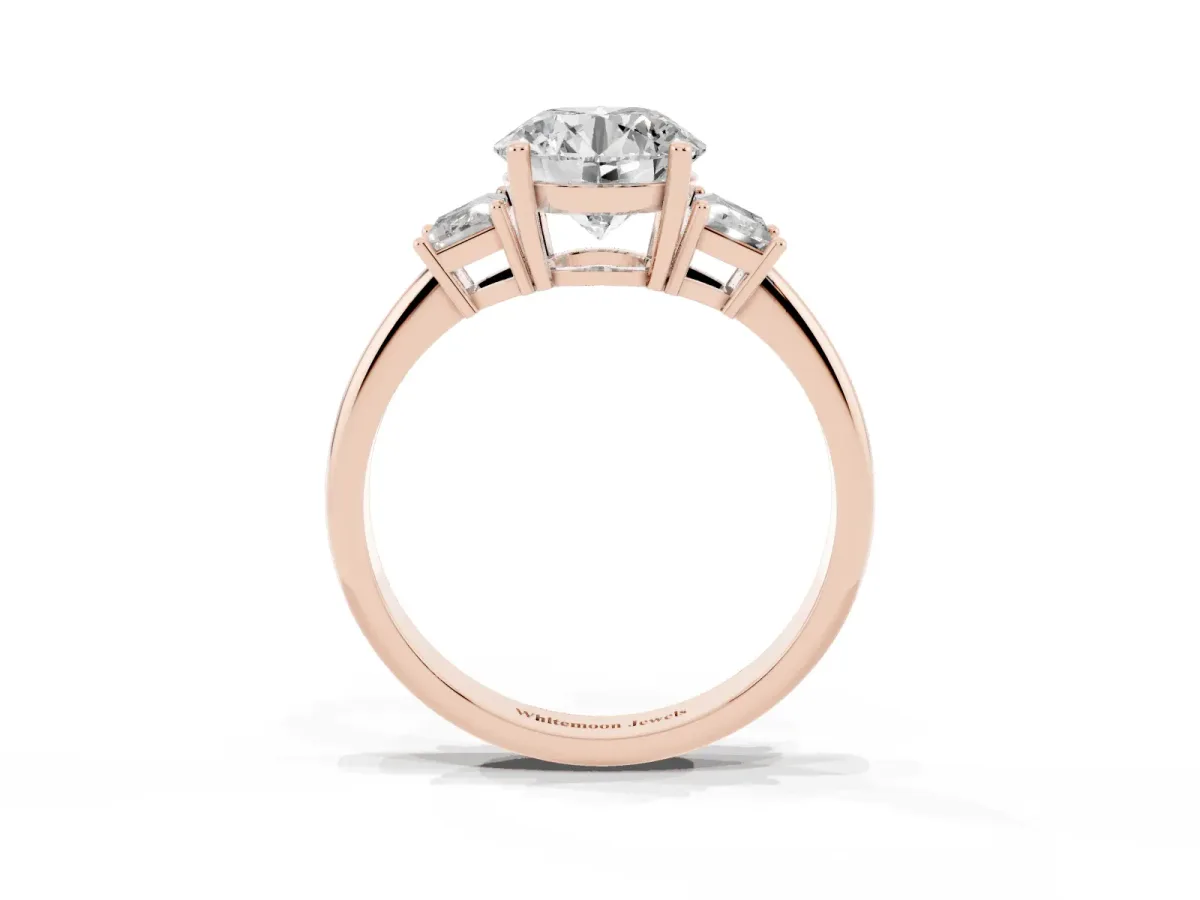 Round Cut Diamond Three-Stone Ring with Trapezoid Side Stones and Prong Setting Rose gold