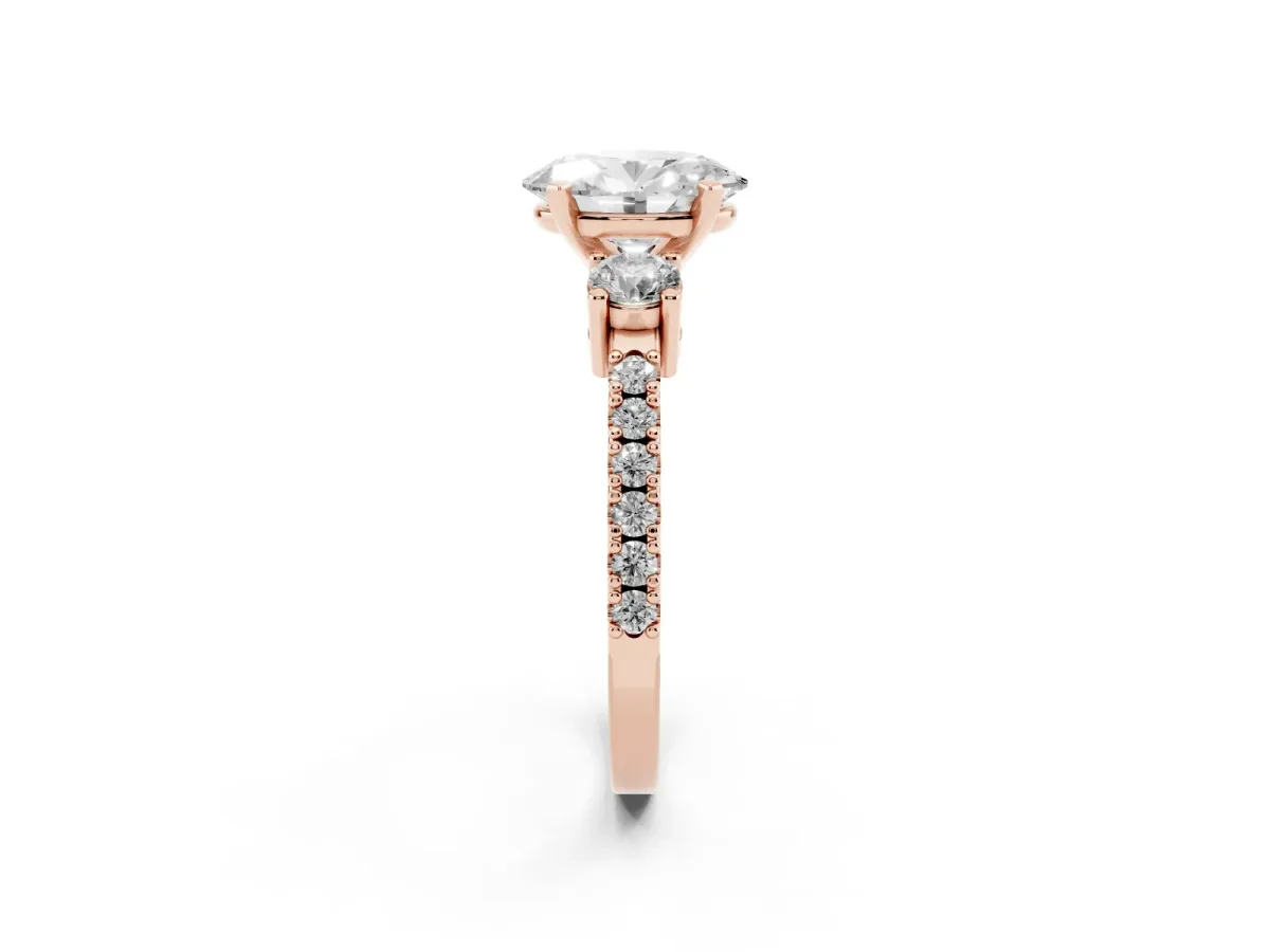 Oval Cut Three-Stone Diamond Pavé Band with Prong Setting Rose gold