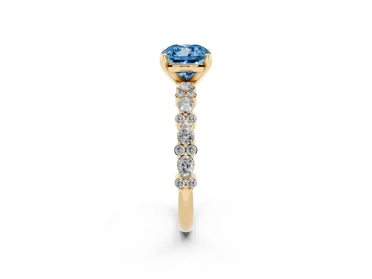 Fancy Blue Cushion Cut Diamond Side Stone Solitaire Ring with Round and Four-Prong Setting Yellow gold
