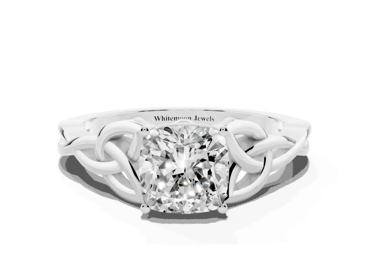Cushion Cut Diamond Solitaire Engagement Ring with Celtic Knot Band and Four-Prong Setting Platinum