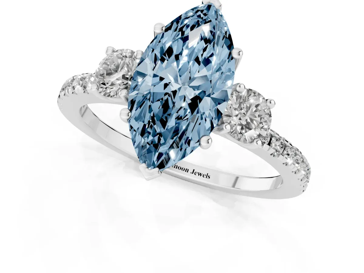 Fancy Blue Three-Stone Marquise Cut Cut Diamond Pavé Band with Prong Setting Platinum