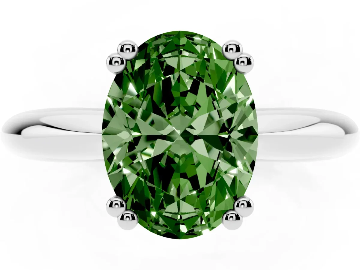 Fancy Green Oval Cut Cut Solitaire Engagement Ring with Tapered Band and Four-Prong Setting Silver