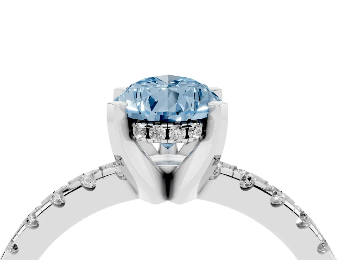 Fancy Blue Pear Cut Diamond Solitaire Ring with Round Pavé Band and Four-Prong Setting Silver