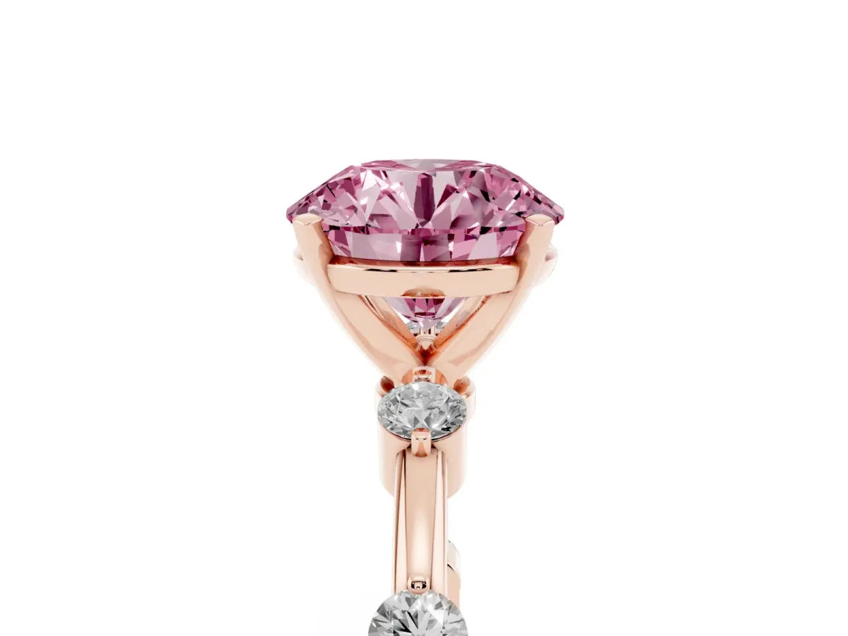 Fancy Pink Round Cut Solitaire Diamond Ring with Bezel Set Side Stones and Prong Setting Rose gold