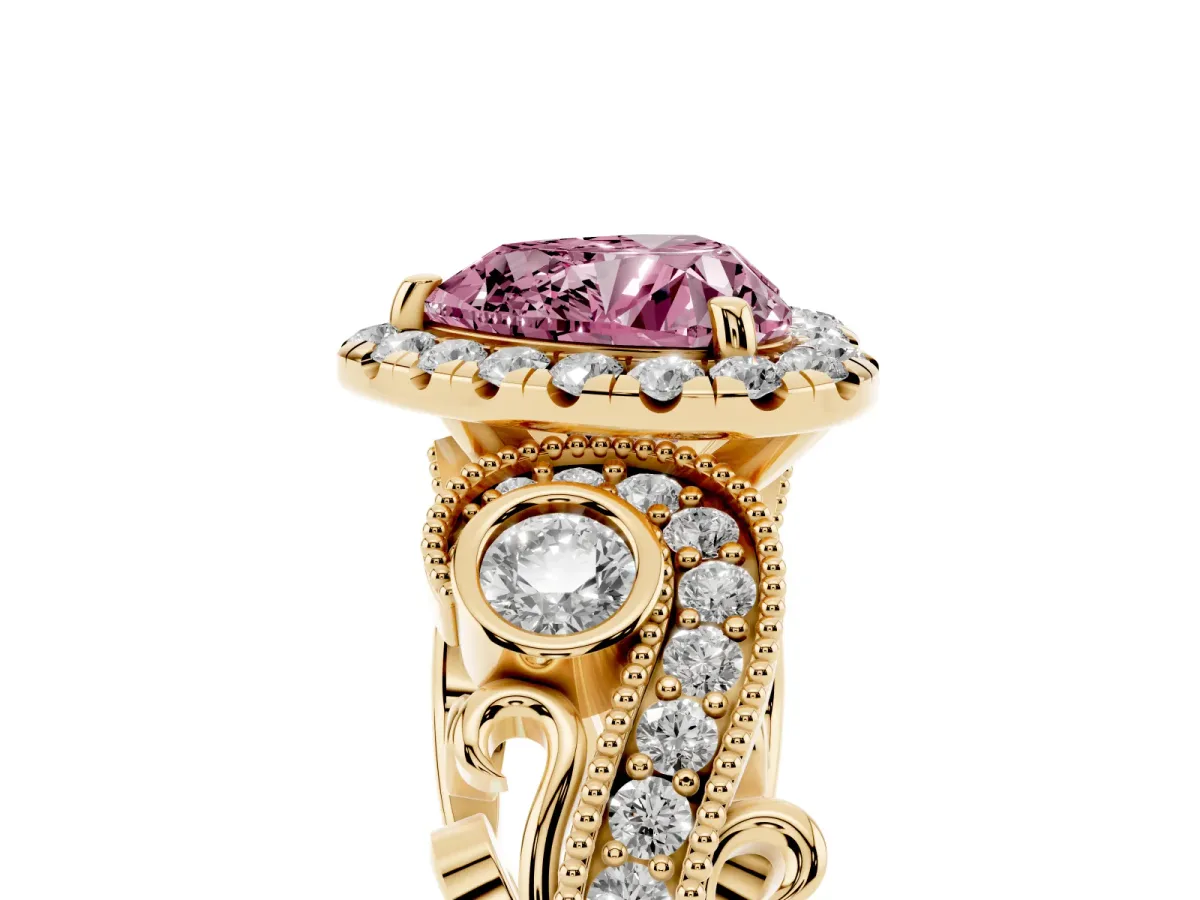 Fancy Pink Heart Cut Halo Diamond Ring with Milgrain and Bezel Accents on a Split Shank Band Yellow gold