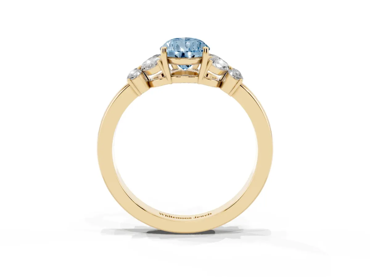 Fancy Blue Pear Cut Cut Solitaire Floral Diamond Ring with Four-Prong Setting Yellow gold