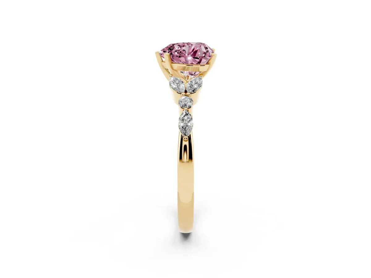Fancy Pink Heart Cut Diamond Solitaire Ring with Side Stones and Four-Prong Setting Yellow gold