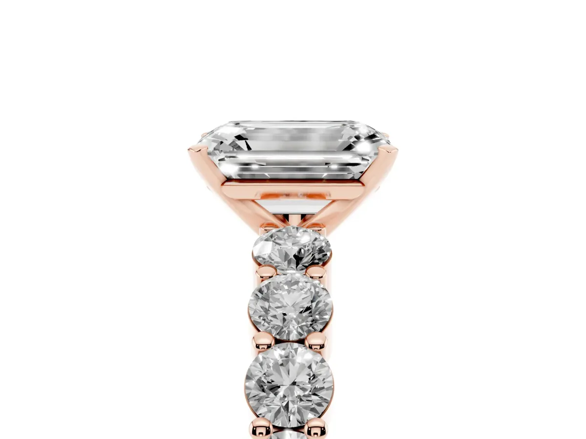 Emerald Cut Diamond Solitaire Ring with Shared Prong Round Side Stones Rose gold