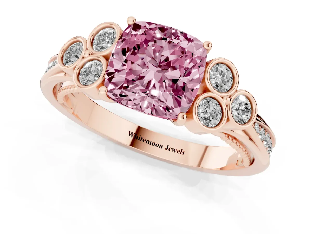 Fancy Pink Cushion Cut Cut Diamond Engagement Ring with Bezel Set Round Side Stones and Prong Setting Rose gold