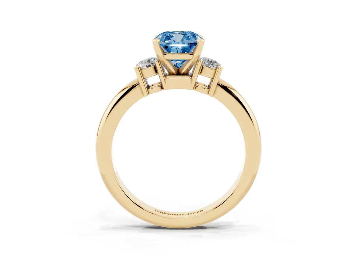 Fancy Blue Three-Stone Cushion Cut Cut Diamond Solitaire with Prong Setting and Classic Band Yellow gold