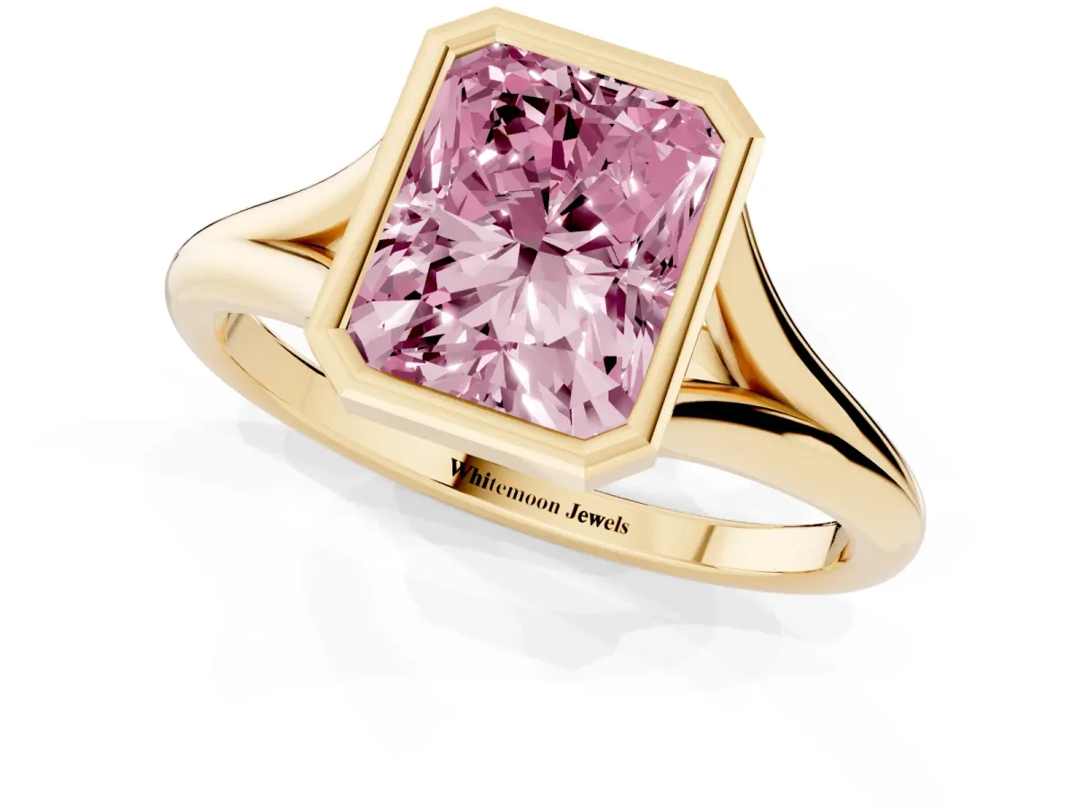 Fancy Pink Bezel Set Radiant Cut Cut Solitaire Ring with Tapered Band Yellow gold