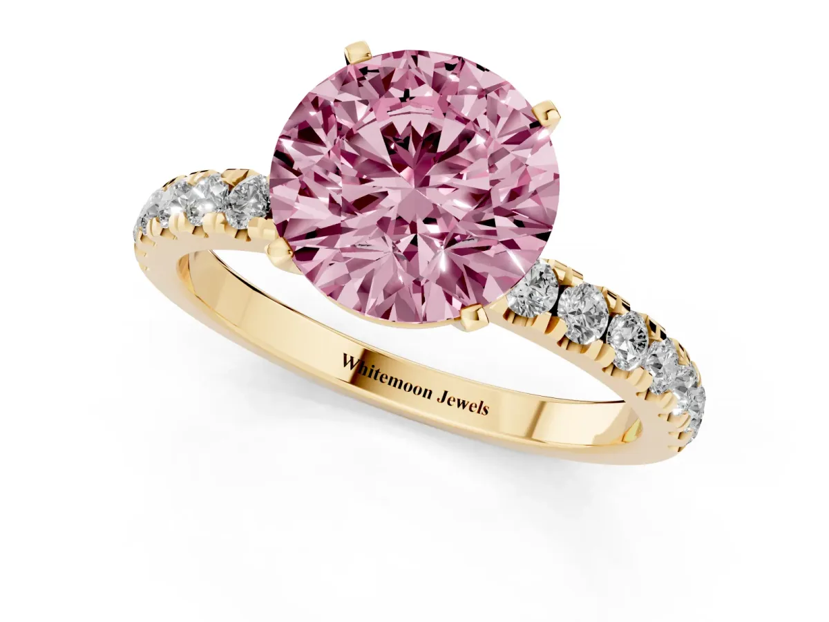 Fancy Pink Round Cut Diamond Solitaire Ring with Pavé Accents and Four-Prong Setting Yellow gold